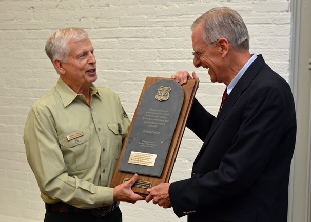 Tom Tidwell, Chief of the Forest Service, presenting award to Terry Klein, SRI Foundation - Photo by Dominic Cumberland